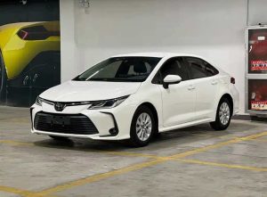 A 2021 White Toyota Corolla 1.5L Pioneer with low mileage ( 42,620 miles), in excellent condition, ready for export overseas at any time.