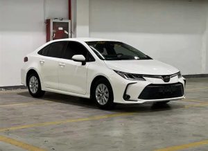 A 2021 White Toyota Corolla 1.5L Pioneer with low mileage ( 42,620 miles), in excellent condition, ready for export overseas at any time.