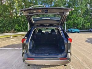 Back view of A 2023 white Toyota RAV4 with low mileage (45,000 miles), in excellent condition, ready for export overseas at any time.